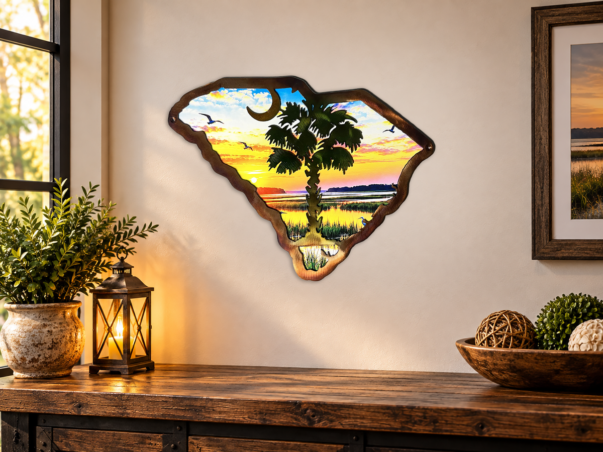 South Carolina palmetto metal wall art with coastal sunrise displayed on a living room wall.