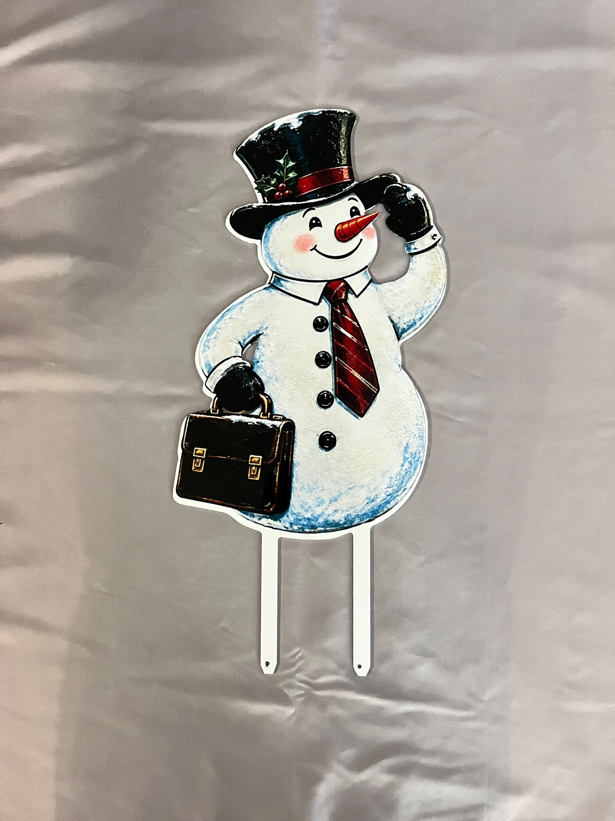 Handcrafted Sir Flurrington metal snowman yard stake with top hat, red tie, briefcase and ground stakes