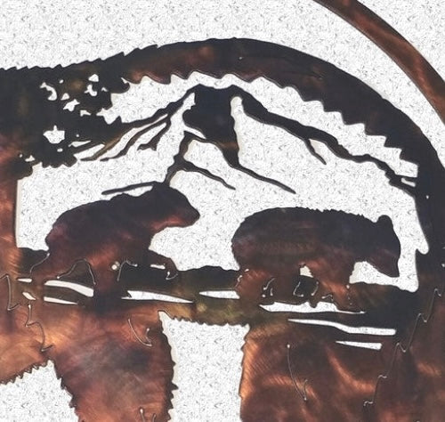 Close-up of mama bear and cub detail showing hand-finished steel patina