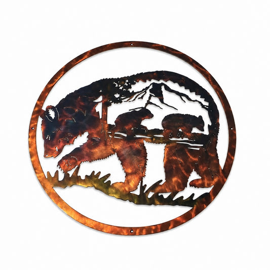 Round mama bear and cubs metal wall art with mountain scene on a soft white background