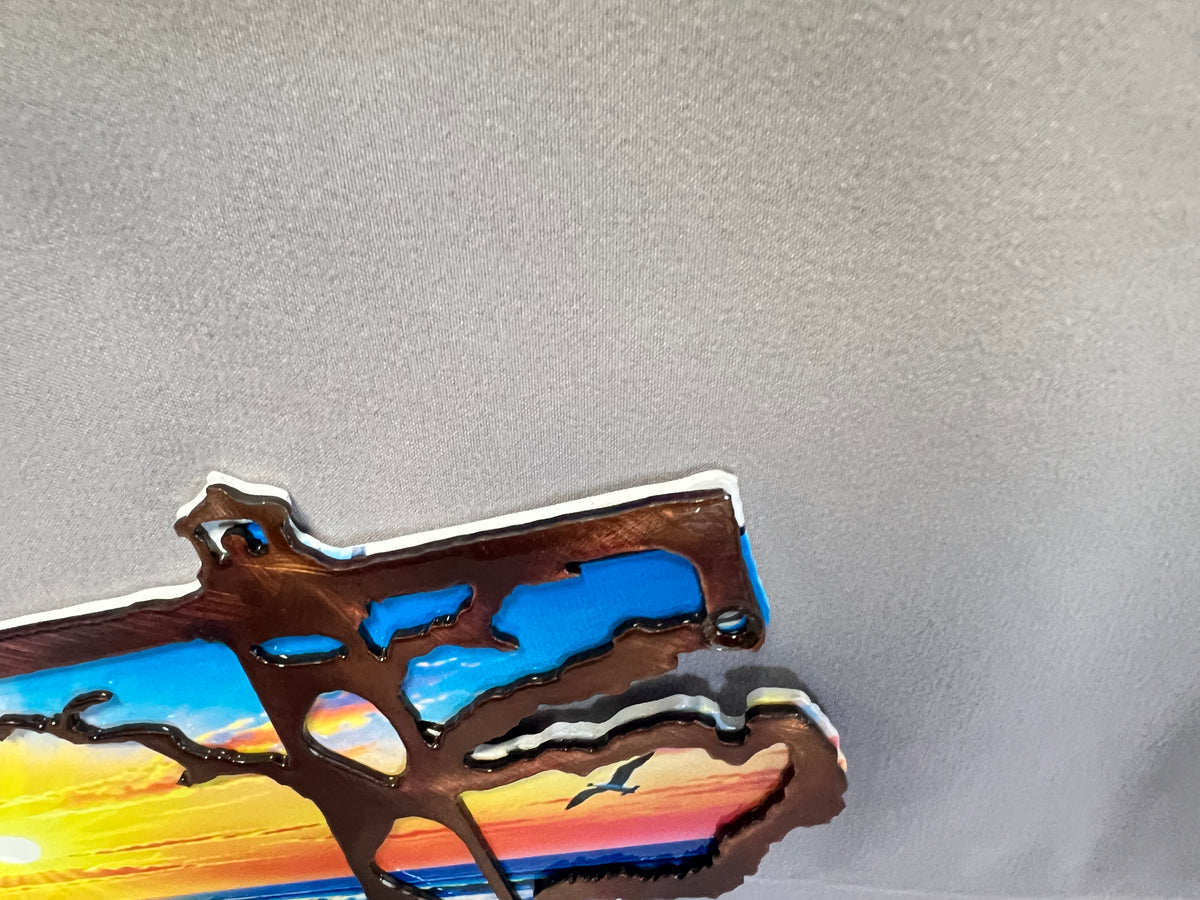 North Carolina layered metal wall art with UV-printed mountain-to-coast sunrise scene and hand-finished steel foreground.