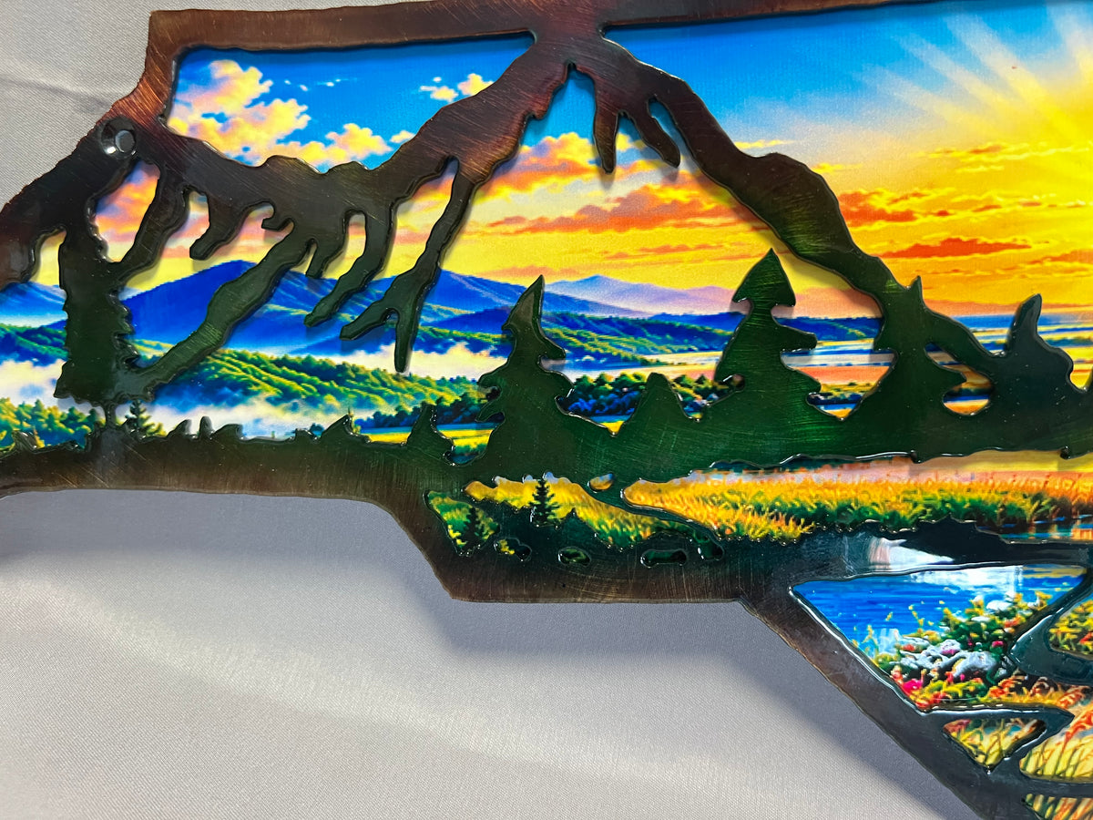 North Carolina layered metal wall art with UV-printed mountain-to-coast sunrise scene and hand-finished steel foreground.