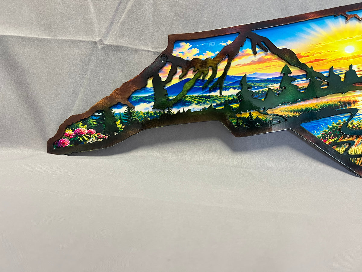 North Carolina layered metal wall art with UV-printed mountain-to-coast sunrise scene and hand-finished steel foreground.