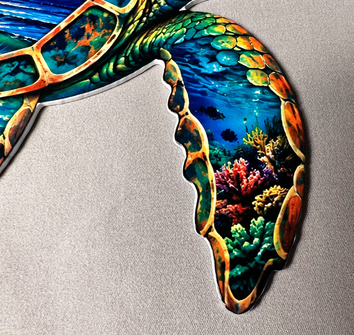 Ocean fish and reef on sea turtle flipper