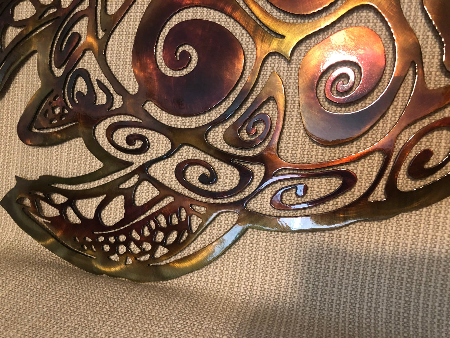 close up of the finish on a sea turtle wall art