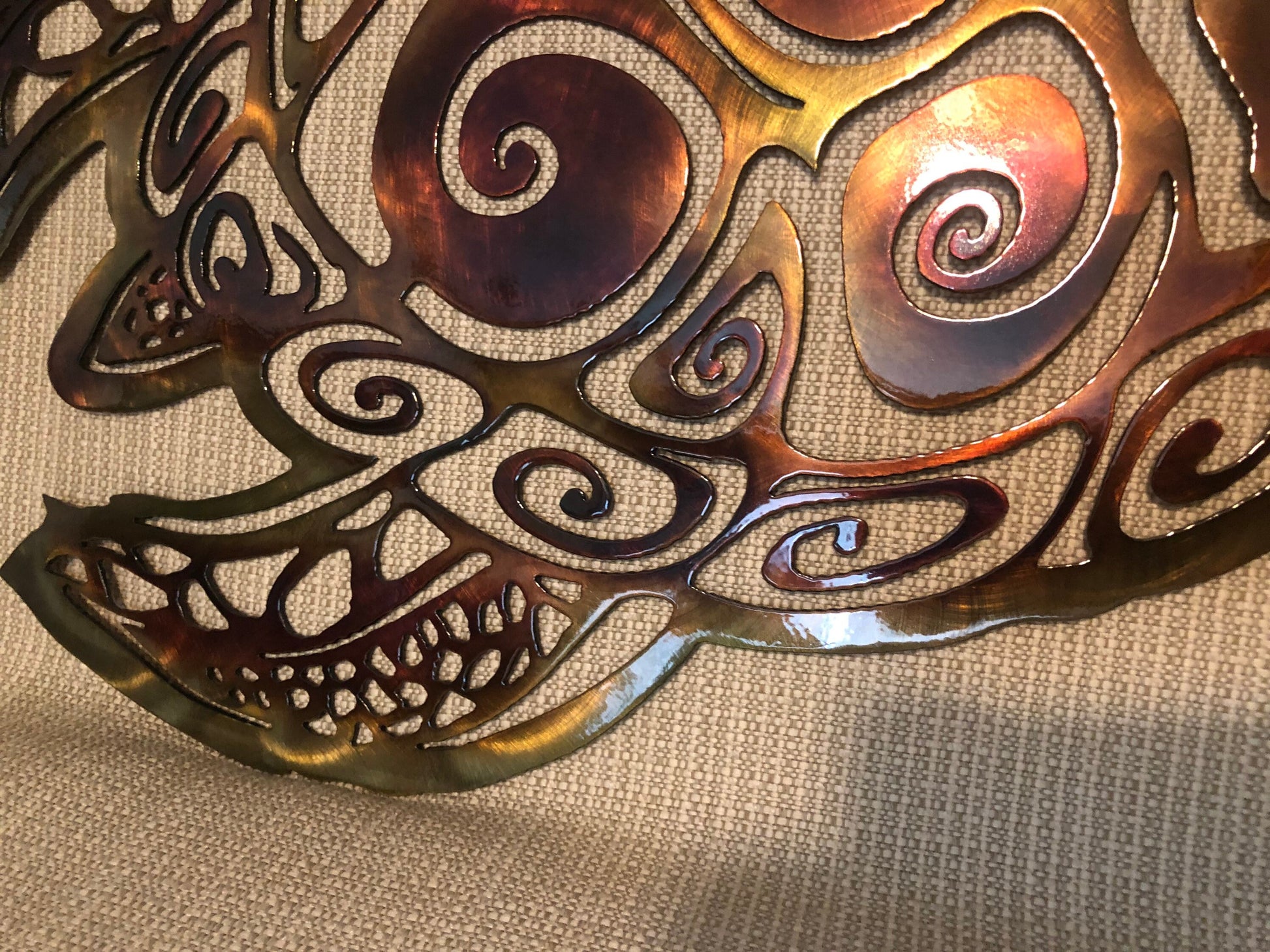 close up of the finish on a sea turtle wall art